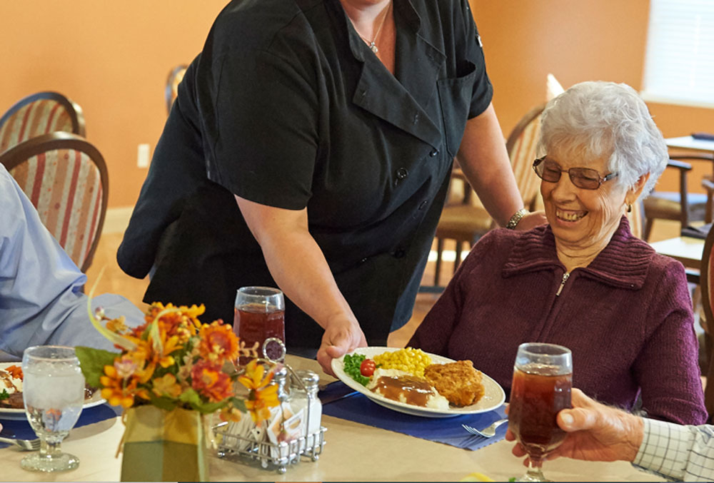 residents being served a meal